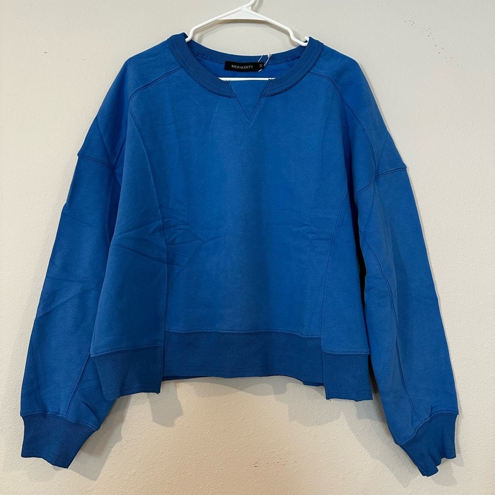 NWT MEROKEETY crewneck in royal blue size medium, with a bit of a cropped‎ look.